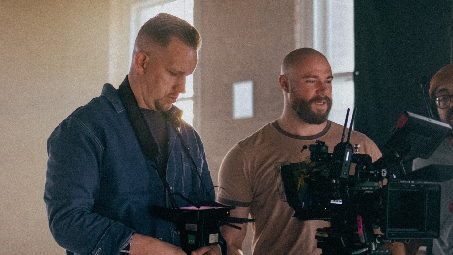 A director and Cinematographer using a cinema camera and capturing a shot for a commercial