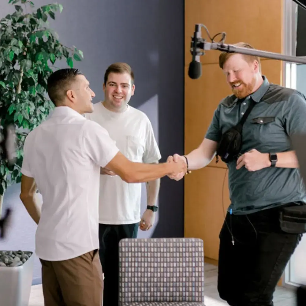 client and dp shaking hands